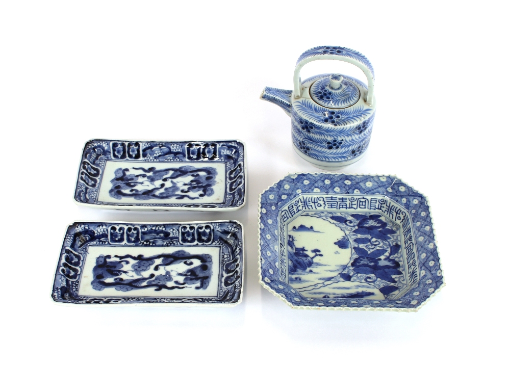 An early 18th Century Japanese kettle shape blue and white porcelain wine pot, with foliate