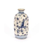 A manganese and under-glazed blue Continental pottery bottle vase, painted with figures and flowers,