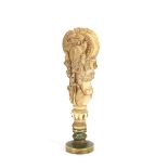 An 18th Century Anglo/Indian ivory handled seal, with foliate carved decoration, 10cm