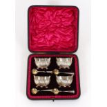 A cased set of four late Victorian silver salts, of half fluted boat shape, Sheffield 1897; together