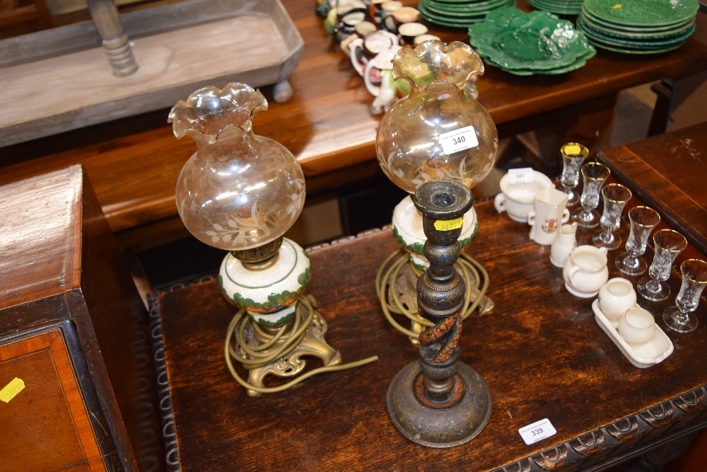 A pair of pottery and brass table lamps with glass