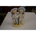 A Parian ware figurine of two children holding cat