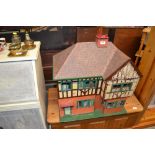 A painted wooden doll's house