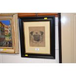 A framed and glazed charcoal study of a pug dog co