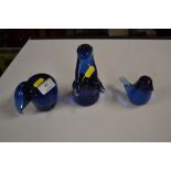 Three Wedgwood blue glass paper weights in the for