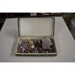 A box of costume necklaces and jewellery