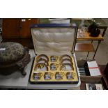 A Noritake hand painted coffee set in fitted case