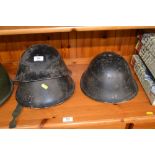 Three 1944 patent British helmets