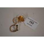 A 9ct gold emerald set ring; and a yellow metal an