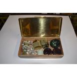 A brass box of various jade items to include small