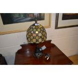 A Tiffany style table lamp