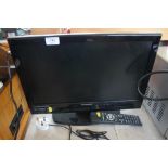 A Digihome flat screen television with remote cont