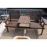 A hardwood garden bench with a fitted integral tab