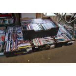 Four boxes of various DVDs