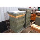 Two bee hives on stand