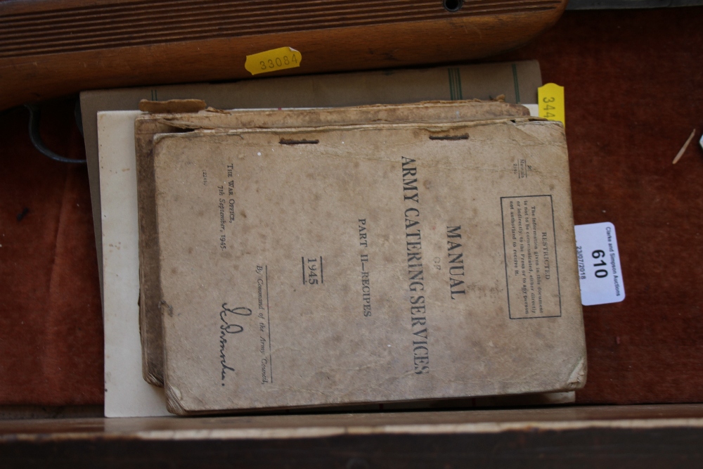 A quantity of army manuals and car relating manuals