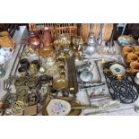 A quantity of metalware to include vases; mincer;