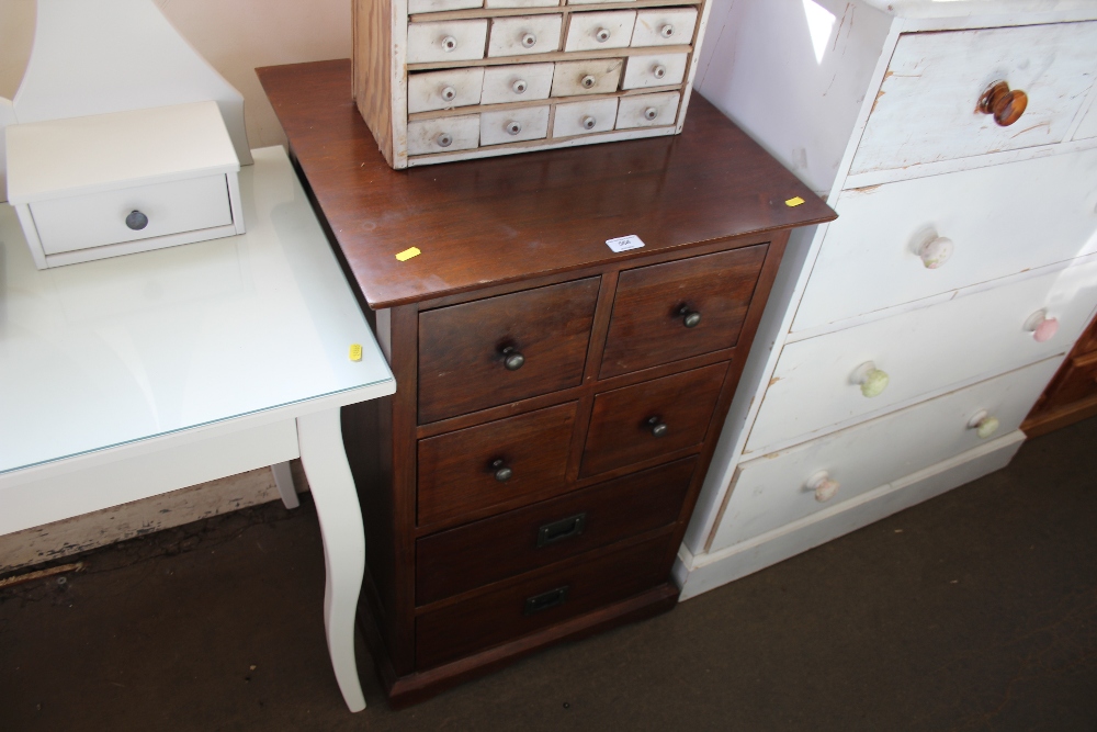 A hardwood multi drawer chest