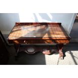 A Victorian mahogany washstand fitted two drawers