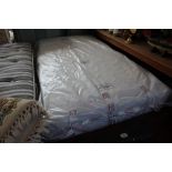 A single divan bed and mattress
