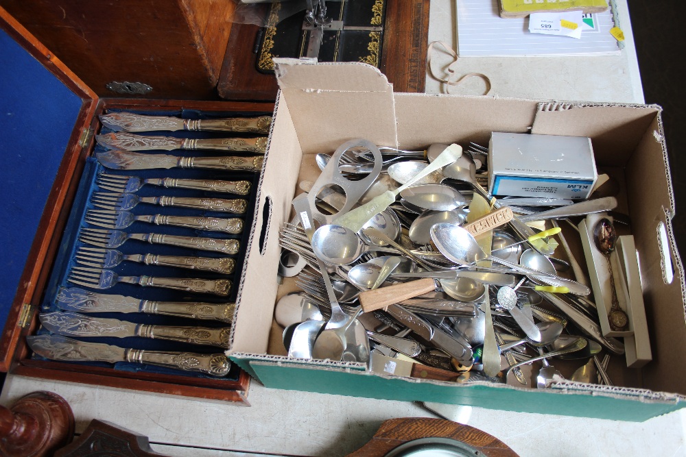 A canteen of cutlery together with a box of variou