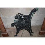 A pair of ornate bench ends