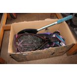 A box containing various rackets etc.