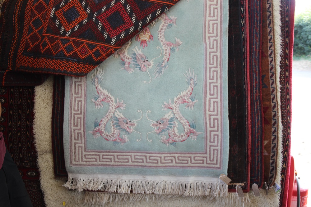 An approx 5'9" x 3' Chinese wool rug