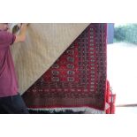 An approx 9' x 6'3" Eastern patterned rug