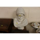 A Parian ware bust of a hooded man