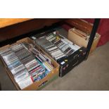 Three boxes of various CDs and books