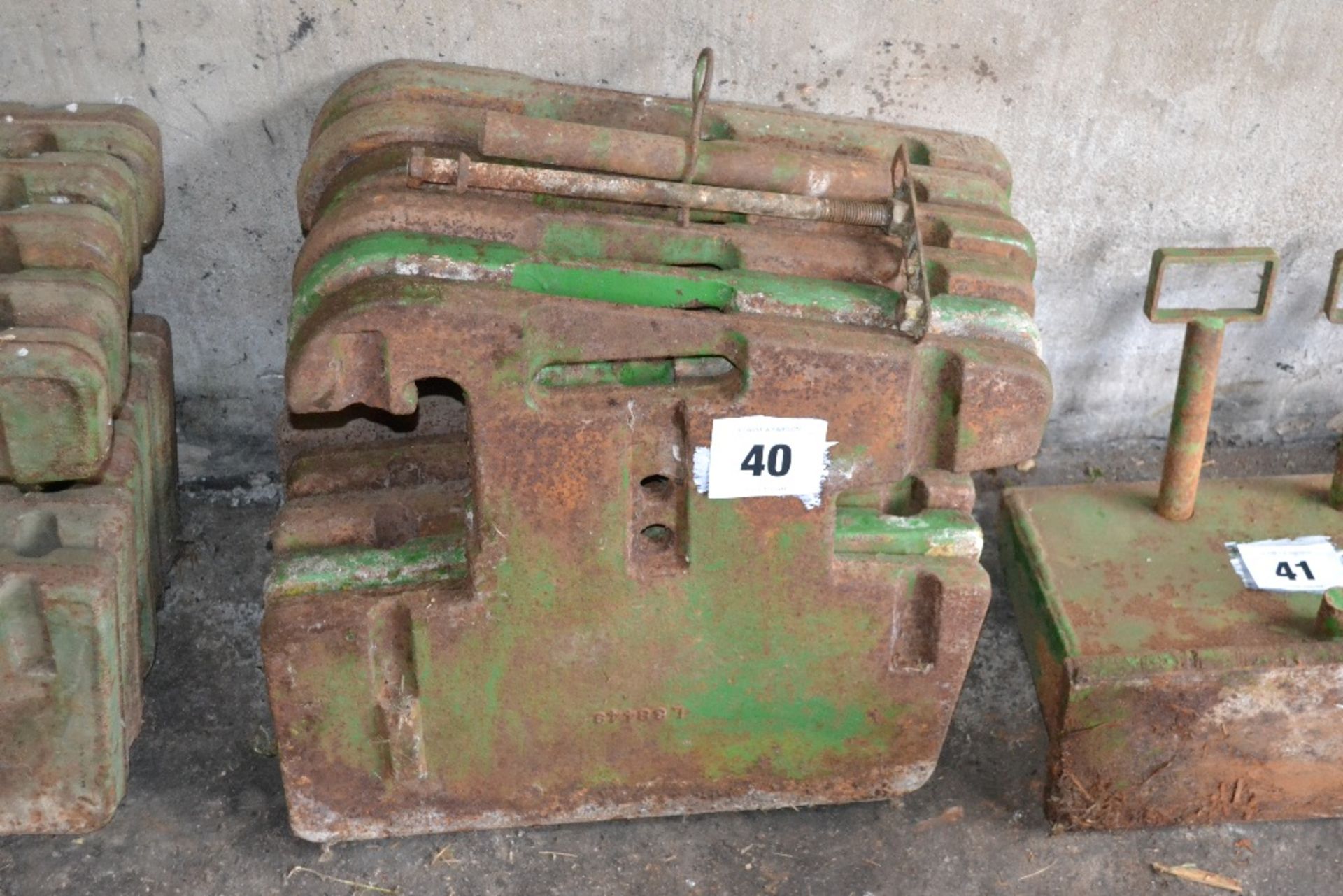 Set of six John Deere front weights.