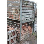 Two steel crates containing terracotta panets, var