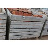 A crate of roofing tiles