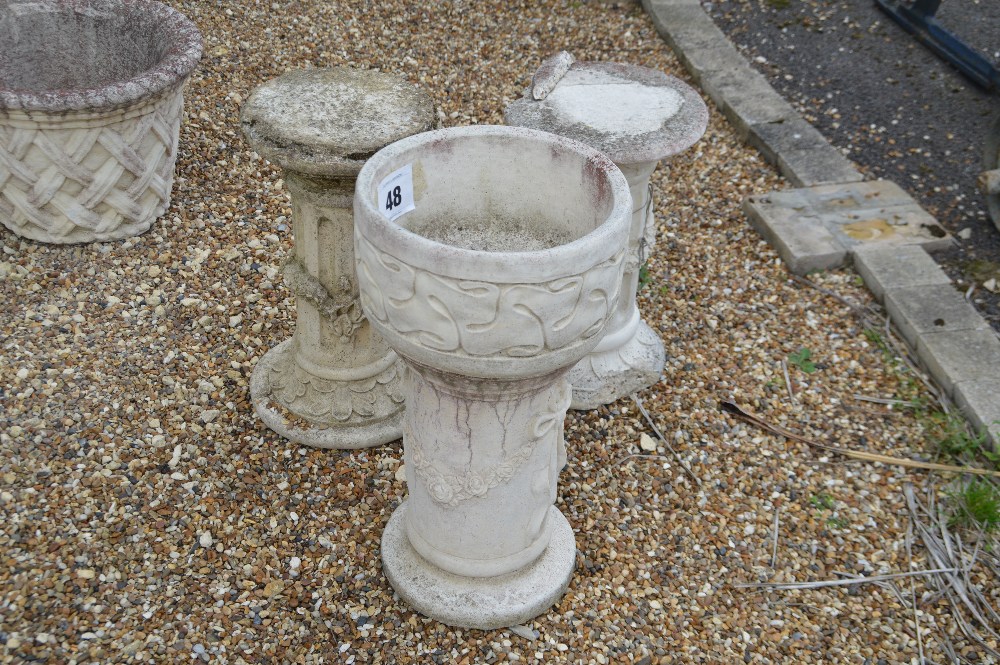 A pre-cast bird bath, approx. 62cm with two addition