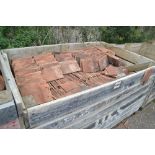 A crate of plain peg tiles