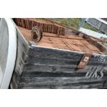 A crate of concrete peg tiles