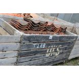 A crate of terracotta pantiles