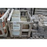 A crate of stoneware slabs