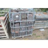 A steel crate of glazed peg tiles