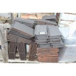 Two pallets of black roof tiles, various sizes