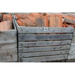 A large crate of roofing tiles