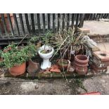 A quantity of garden planters and chimney pots and