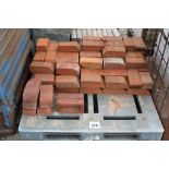 A pallet of edging and other bricks