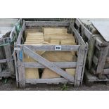 A crate of Indian sandstone paving slabs
