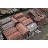 Two pallets of concrete roof tiles