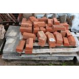 A pallet of concrete pamments and also mixed edgin