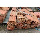 A pallet of re-claimed red rippled tiles