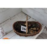 A basket of brass door knobs and locks