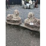 2x pre-cast lion ornaments, approx. 40cm each